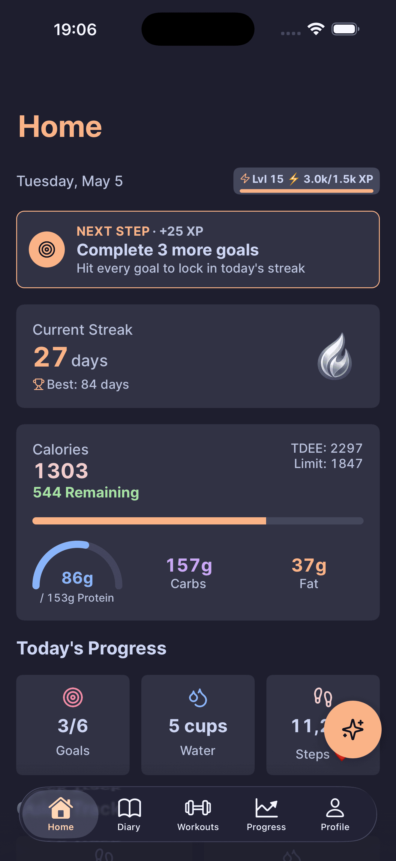 DailyGoal home dashboard with the live level chip in the header alongside streak, macros, and goals.